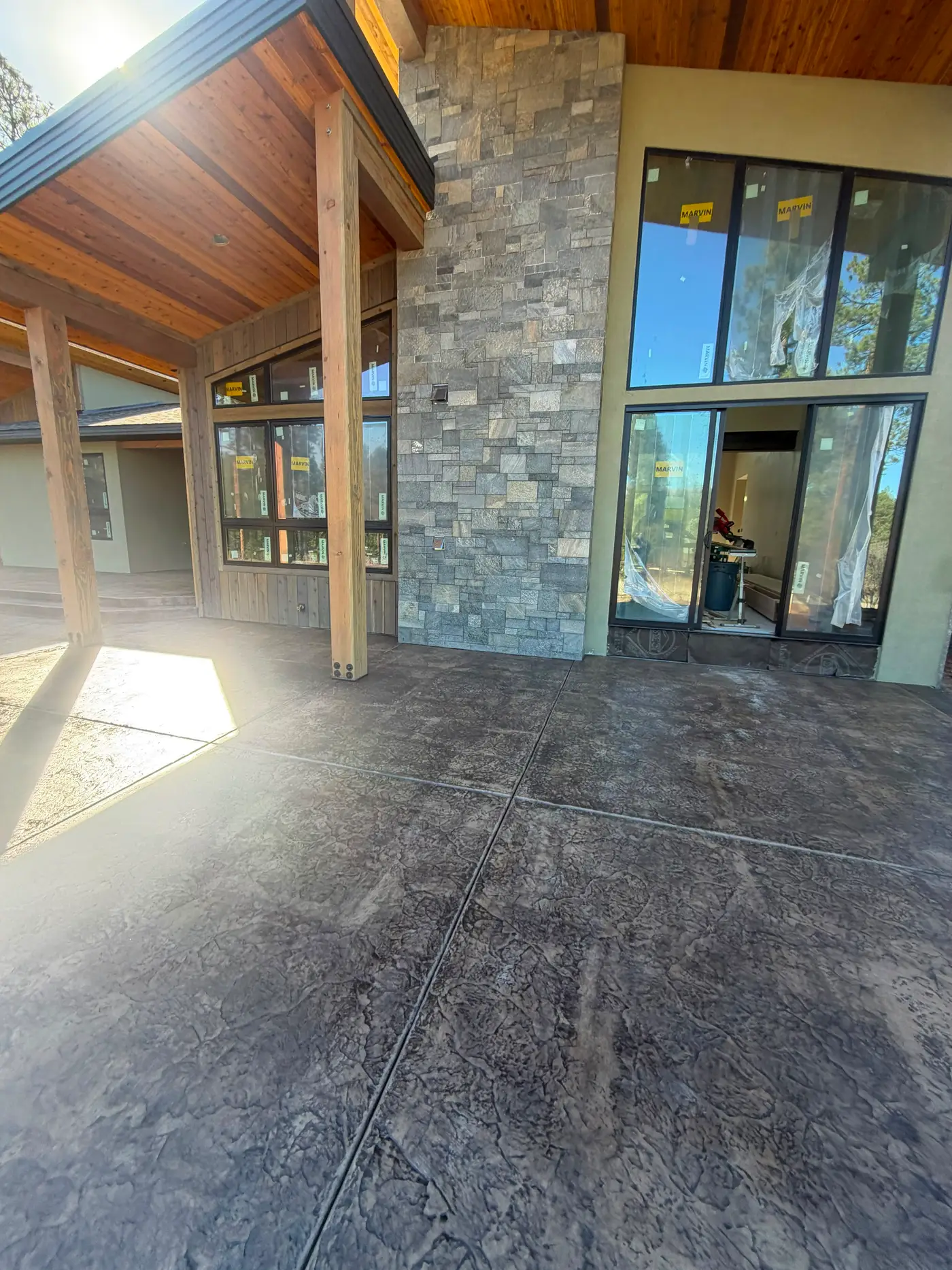 Stone-columned patio and remodeled home exterior built by JH Construction in Farmington, NM